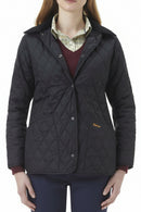 Women's navy quilted jacket with stand collar, button front and diamond stitching