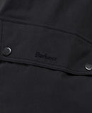 Navy waterproof jacket with Barbour logo and snap buttons on placket