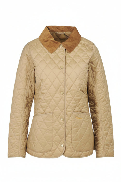 Tan quilted jacket on mannequin with diamond stitching, brown collar, button front.