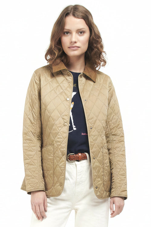 Women’s tan quilted jacket with diamond stitching, brown collar, snap button placket.