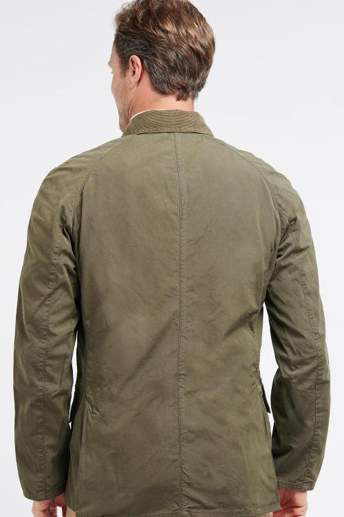 Olive casual jacket back view with center seam and button-down style
