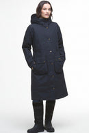 Navy waterproof long parka jacket with hood, front pockets, and gold buttons