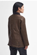 Women's brown waxed jacket with stand collar and buttoned back hem