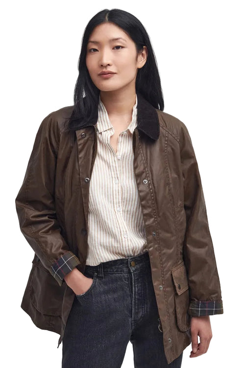 Women's brown waxed jacket with button front, flap pockets, plaid collar lining