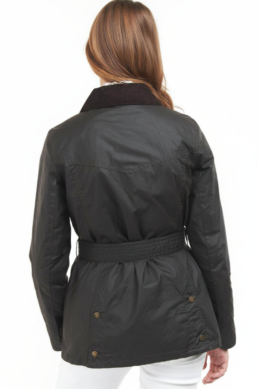 Women's belted waxed jacket, dark color, back view with belt and button details.