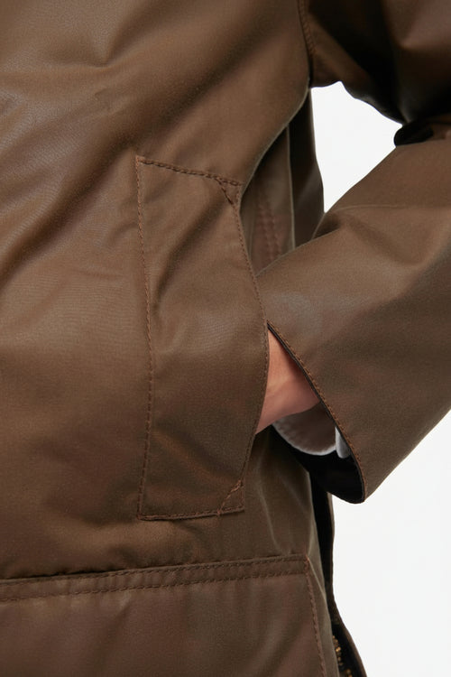 Barbour Beaufort wax jacket, brown sleeve with buttoned cuff and side seam patch
