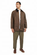 Barbour Beaufort wax jacket, bark brown with button front, flap pockets, and stand collar