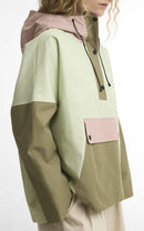 Colorblock showerproof jacket with half-button placket and pink pocket, olive sleeve panel