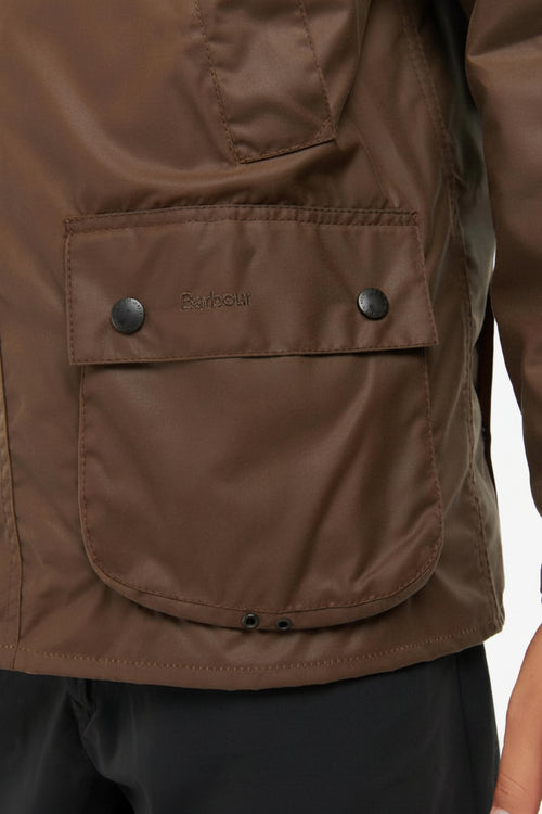 Barbour waxed jacket front pocket panel in bark brown with two snap buttons
