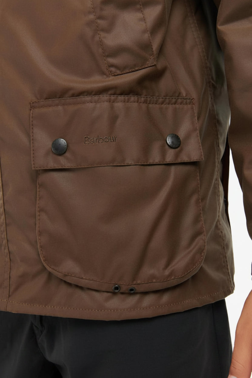 Barbour waxed jacket front pocket panel in bark brown with two snap buttons