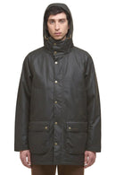 Dark olive hooded wax parka jacket with front buttons and chest pockets.
