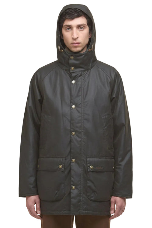 Dark olive hooded wax parka jacket with front buttons and chest pockets.