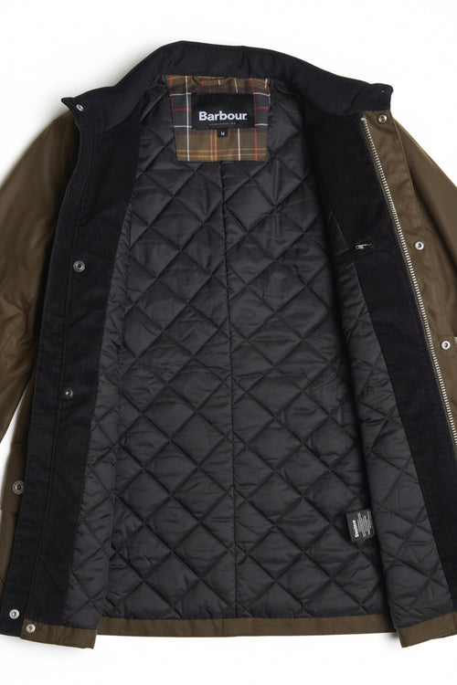 Barbour dark quilted jacket lining with front zipper visible under open coat