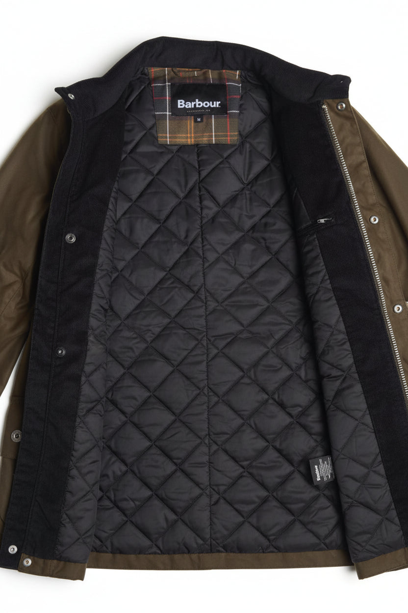 Barbour dark quilted jacket lining with front zipper visible under open coat