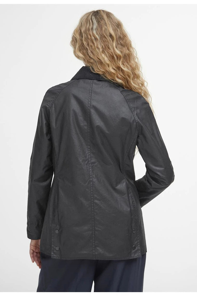 Women’s black wax Beadnell jacket, back view, stand collar and button detailing
