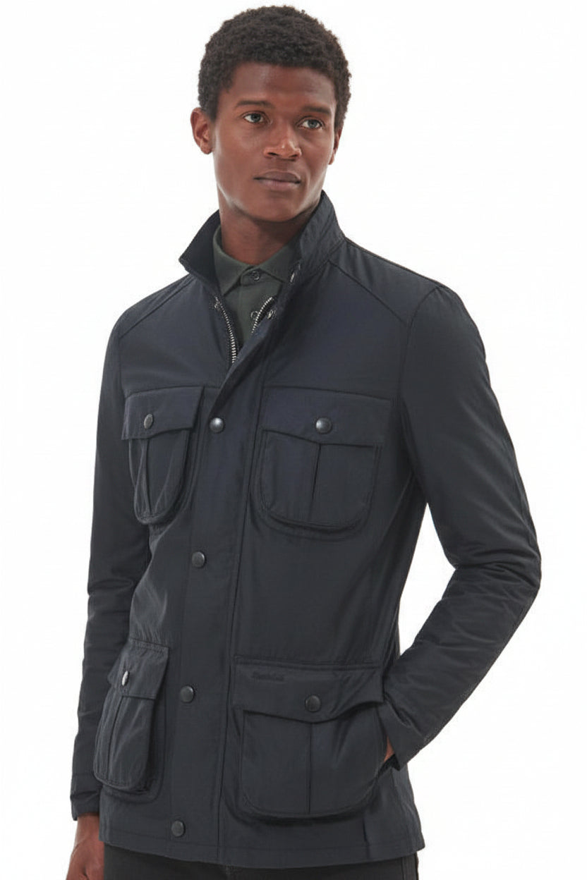 Men's black wax jacket with stand collar, button front, and four flap pockets.