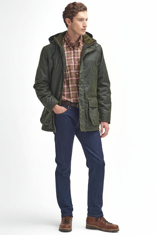 Men's dark green waxed jacket with hood and front zip, layered over a plaid shirt.