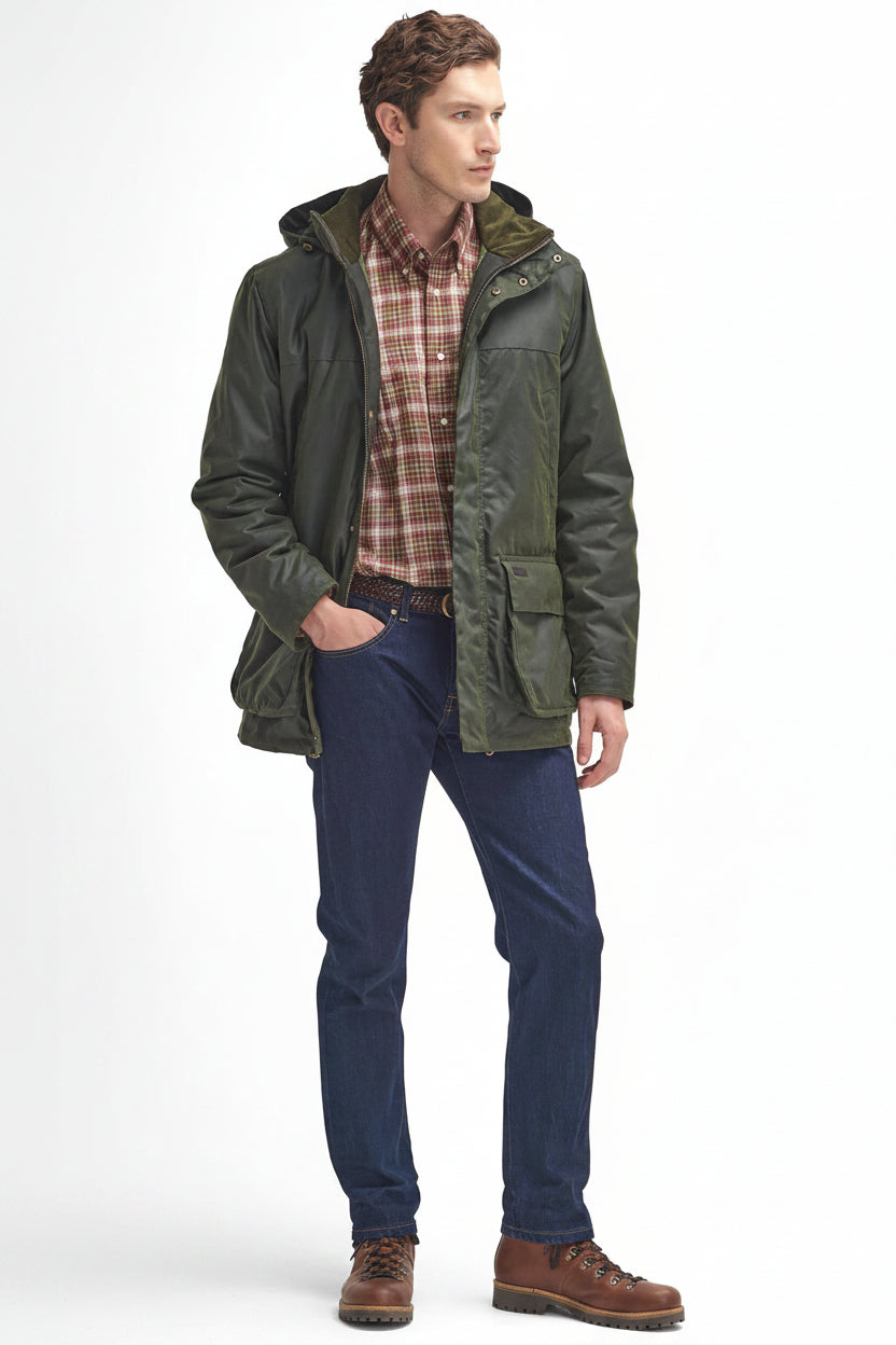 Men's dark green waxed jacket with hood and front zip, layered over a plaid shirt.