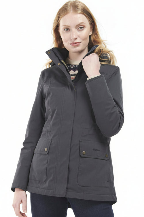 Dark navy waterproof jacket with hood, front zip, and flap chest pockets.