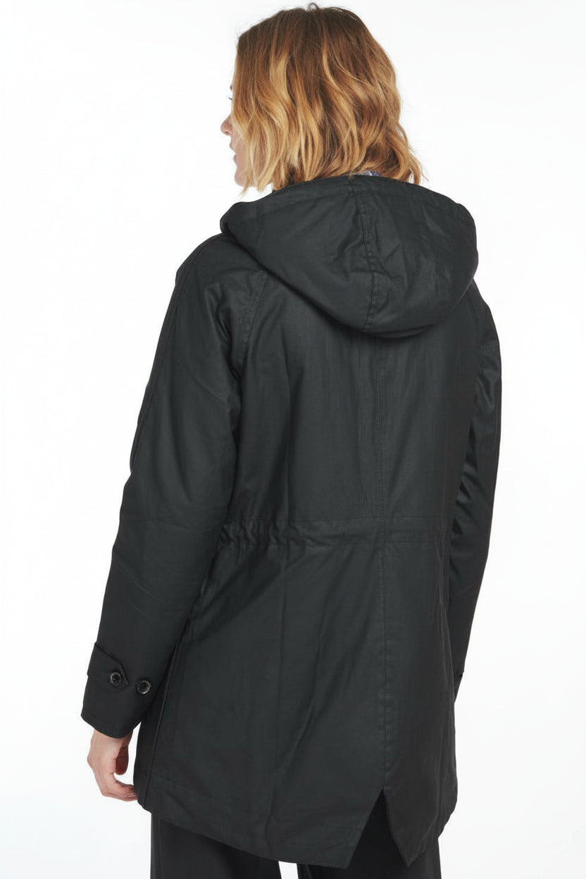 Black hooded wax jacket, back view with curved yoke and adjustable hem