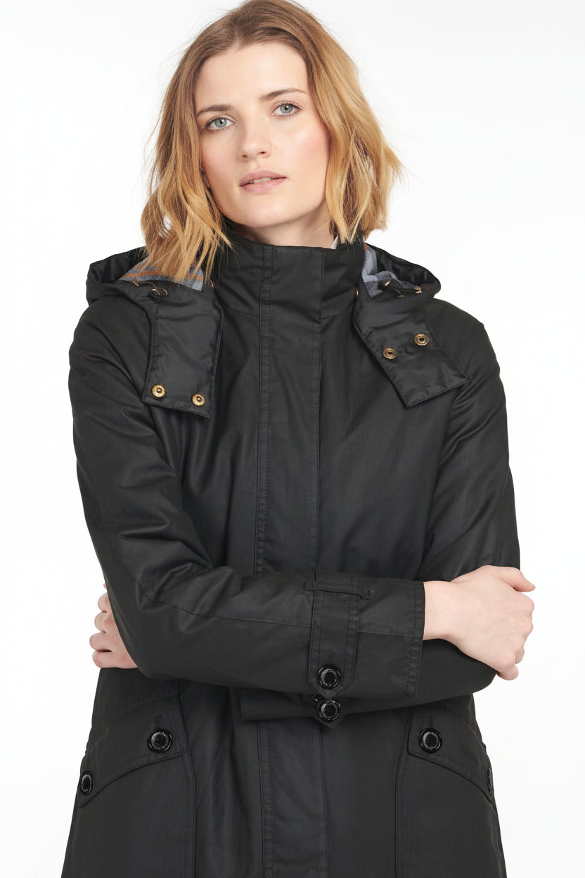 Black wax jacket with hood, gold buttons on epaulettes, front zip and button placket