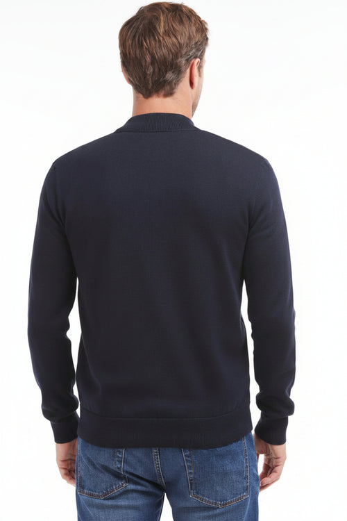Back view of navy zip-through sweater with ribbed cuffs and quilted panels