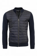 Barbour navy quilted zip-through jacket with knit sleeves and stand collar