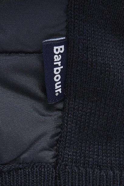 Barbour zip-through knit sweater with navy quilted body and ribbed hem