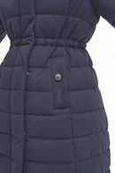 Navy quilted puffer jacket close-up with belted waist and round snap button
