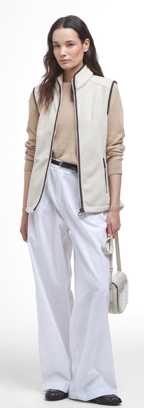 Cream fleece sleeveless gilet vest with full zip, dark trim, and drawstring pocket