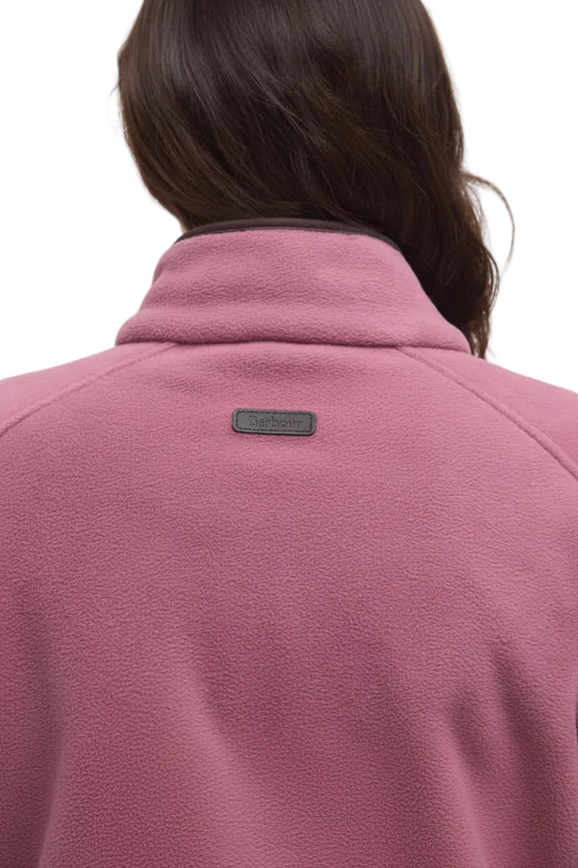 Back view fleece gilet in mauve pink with branded neck patch and stand collar
