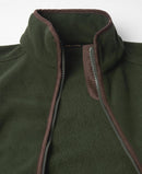 Close-up of sage green fleece gilet collar and zip with brown contrast trim.