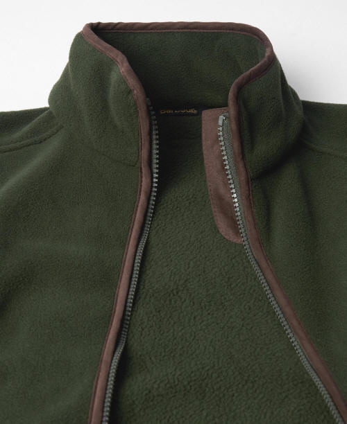 Close-up of sage green fleece gilet collar and zip with brown contrast trim.