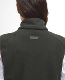 Back of sage green fleece gilet with high neck and small logo label at collar.