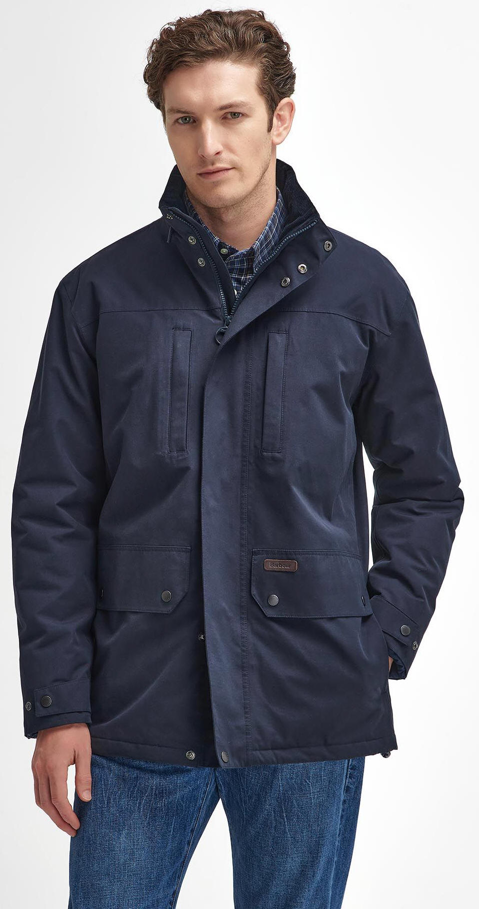 Men's navy waterproof jacket with stand collar, button pockets, and zip fastening.