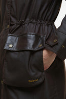Waxed parka with chest patch pockets, Barbour logo, snap closures