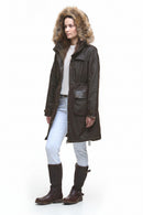 Women’s waxed parka with fur-trimmed hood, front pockets, side view