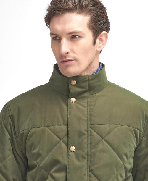 Olive quilted jacket with stand collar and button placket, diamond stitched front panels.