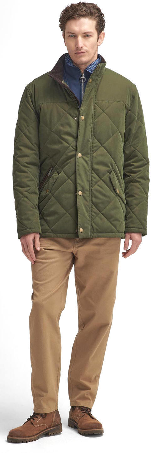 Olive quilted jacket with button closure, stand collar, and diamond quilting, with chinos.