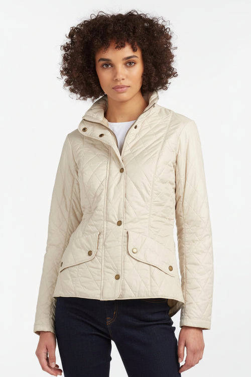 Women’s light-cream quilted jacket with snap front, stand collar, and side pockets