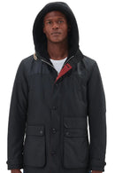 Men's Barbour wax parka with hood, flap pockets, and red collar tab