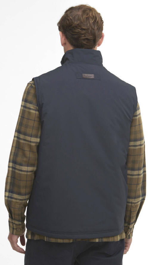 Back view of navy sleeveless gilet vest with short stand collar and small logo tab