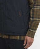Navy gilet vest with chest pocket tab detail and visible part of front zip