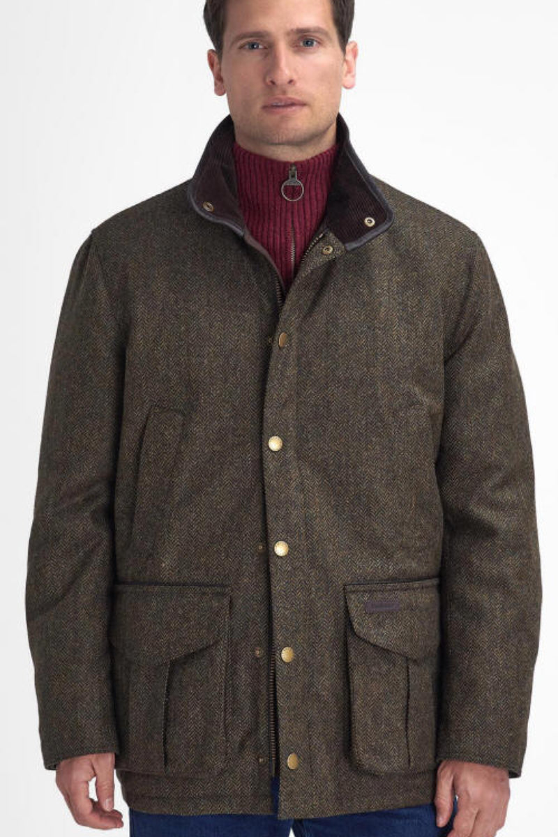 Olive tweed wool jacket with stand collar, brass buttons, and chest flap pockets