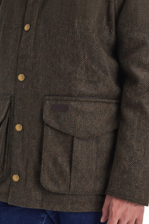 Olive tweed wool jacket with front flap pockets and metal button placket