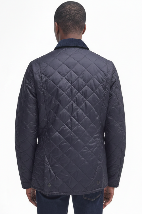 Men's navy quilted jacket back with diamond quilting and two-button hem tabs