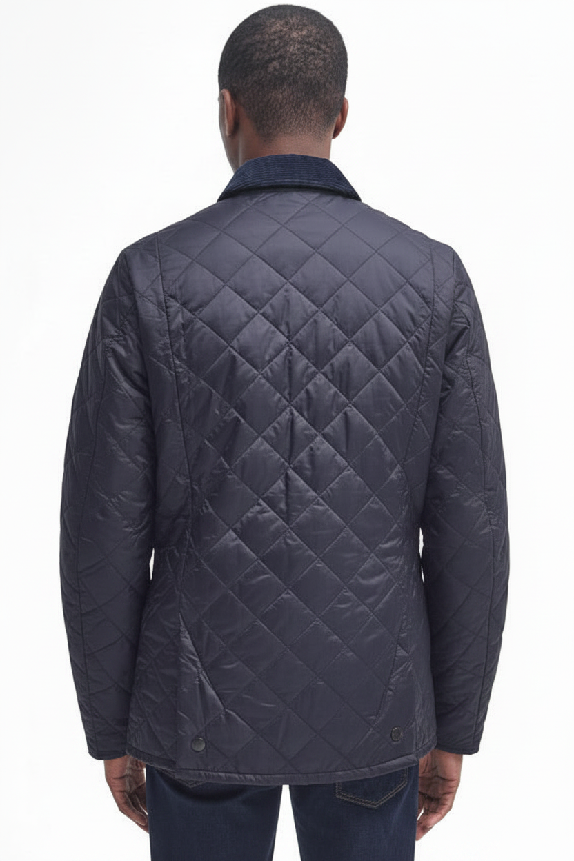 Men's navy quilted jacket back with diamond quilting and two-button hem tabs