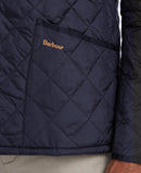 Men's navy quilted jacket front, Barbour logo patch, diamond stitch