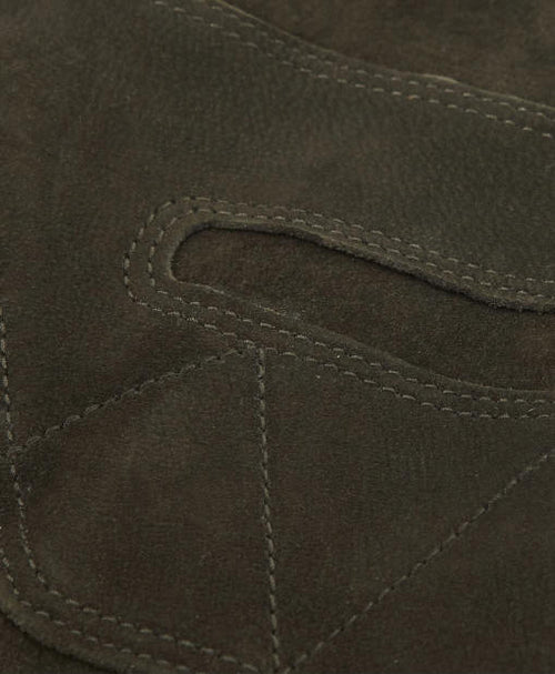 Olive leather glove panel with double-stitched seams and thumb section