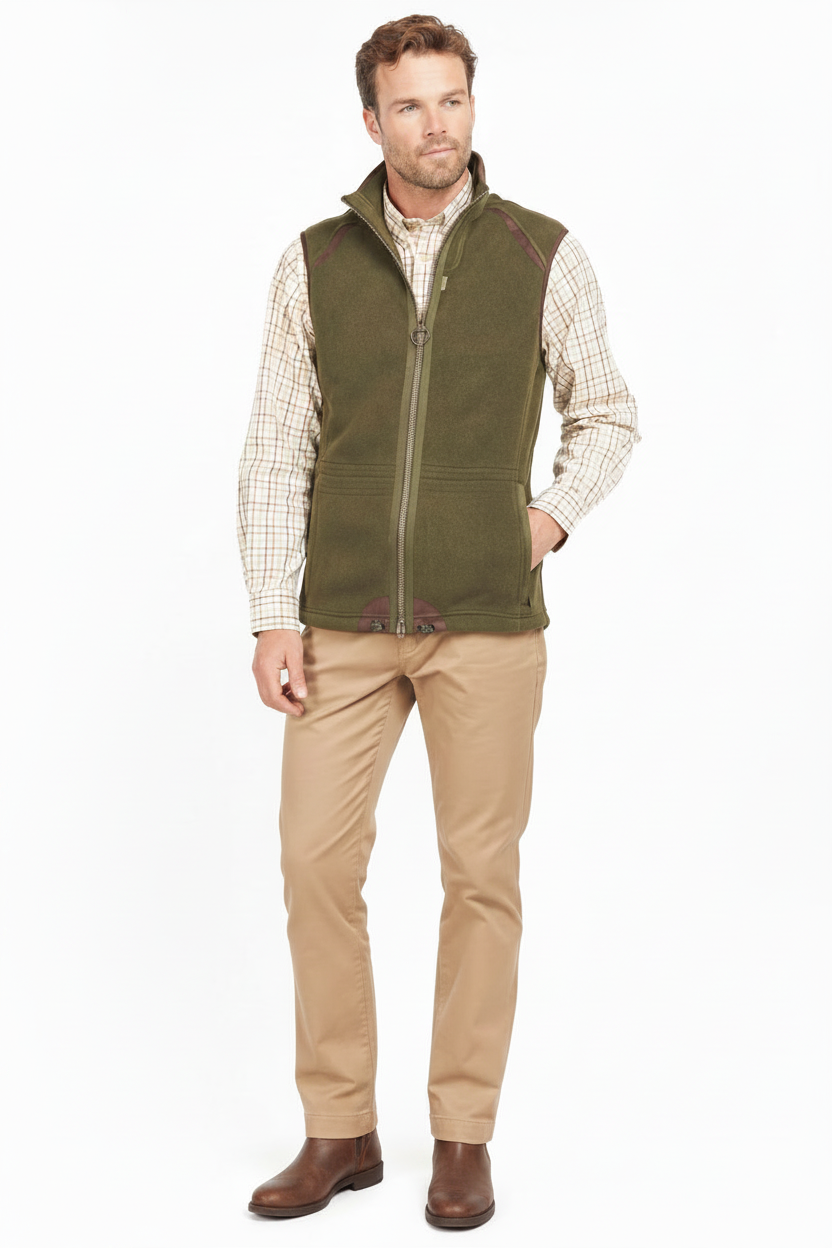 Olive fleece waistcoat with full zip front and stand collar, worn with trousers.